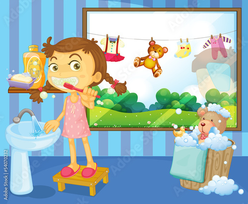 A child brushing her teeth