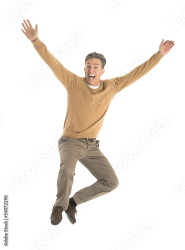 Cheerful Man Jumping Over White Background