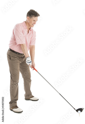 Golfer Playing Golf Against White Background