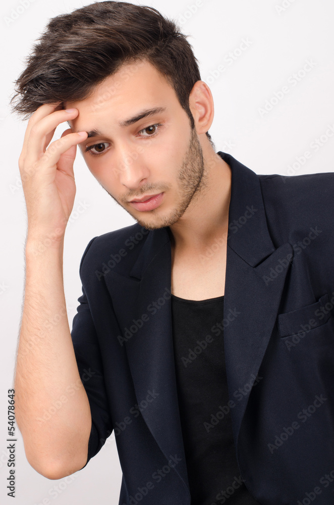 Young beautiful businessman stressed at work Young beautiful businessman stressed at work