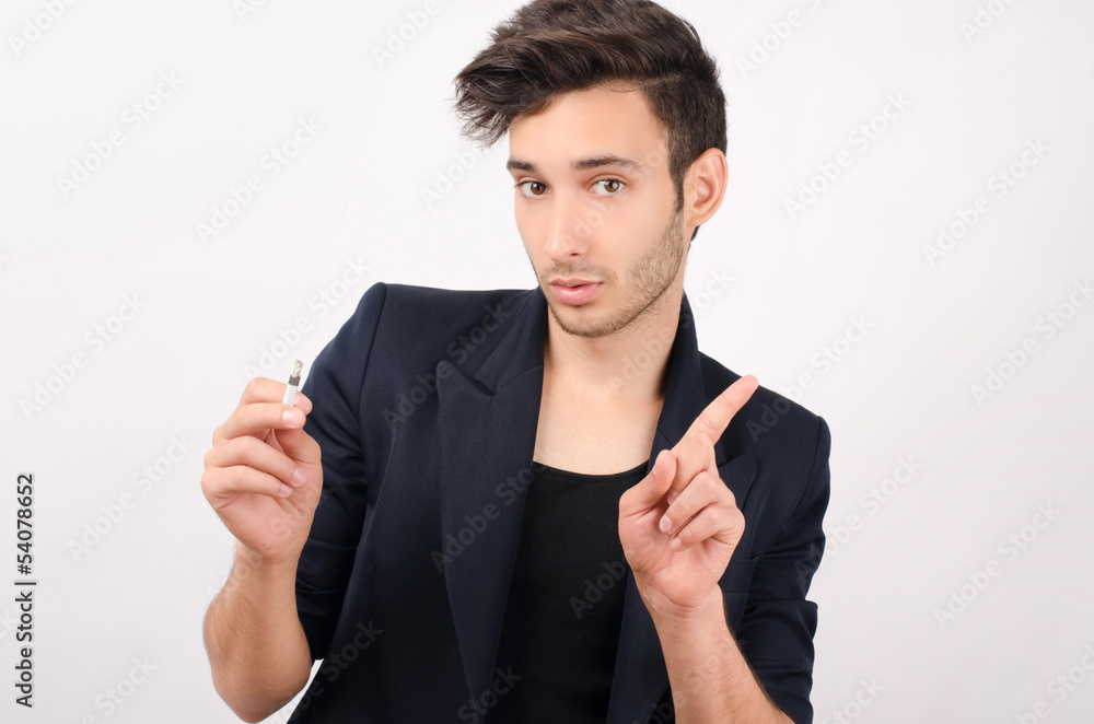 Young beautiful businessman saying no to smoking Young beautiful businessman saying no to smoking
