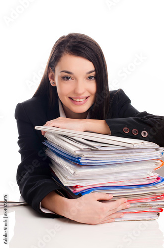 Business woman happy to get a lot of work at her office