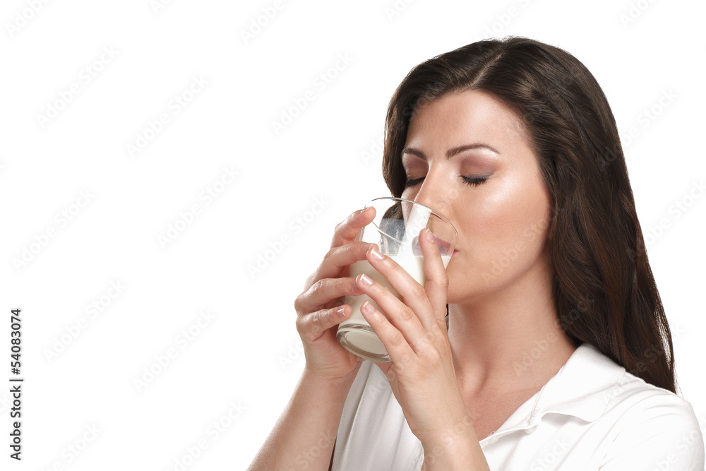 young beautiful woman drink a glass of milk young beautiful woman drink a glass of milk