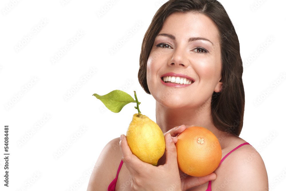young beautiful woman showing fresh fruits of season young beautiful woman showing fresh fruits of season