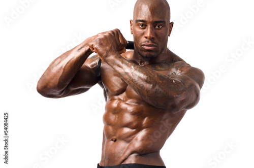 Strong bodybuilder man with perfect abs, shoulders,biceps, chest