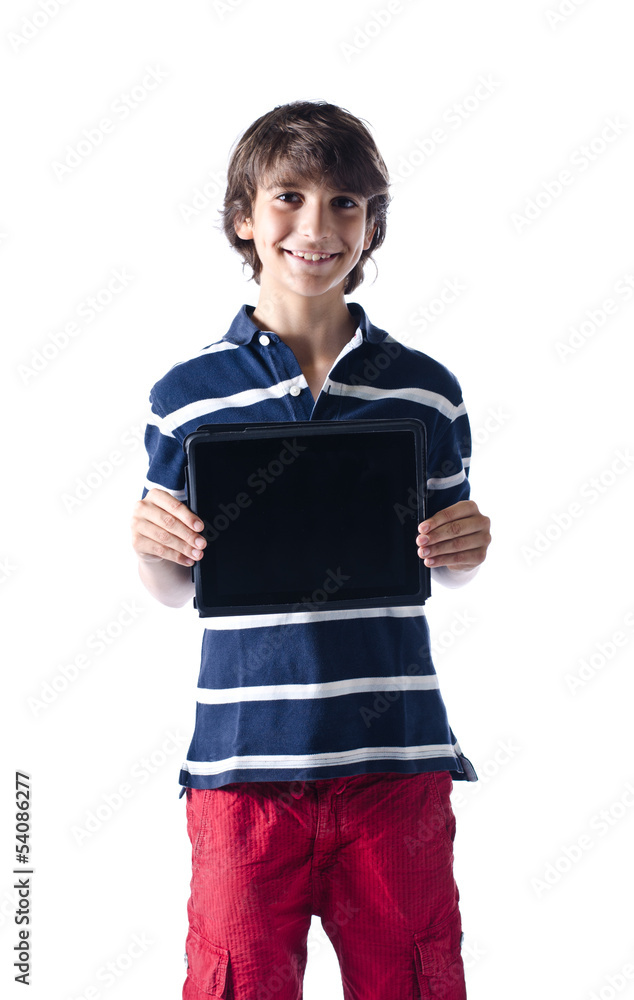 Young boy standing and showing tablet computer Young boy standing and showing tablet computer