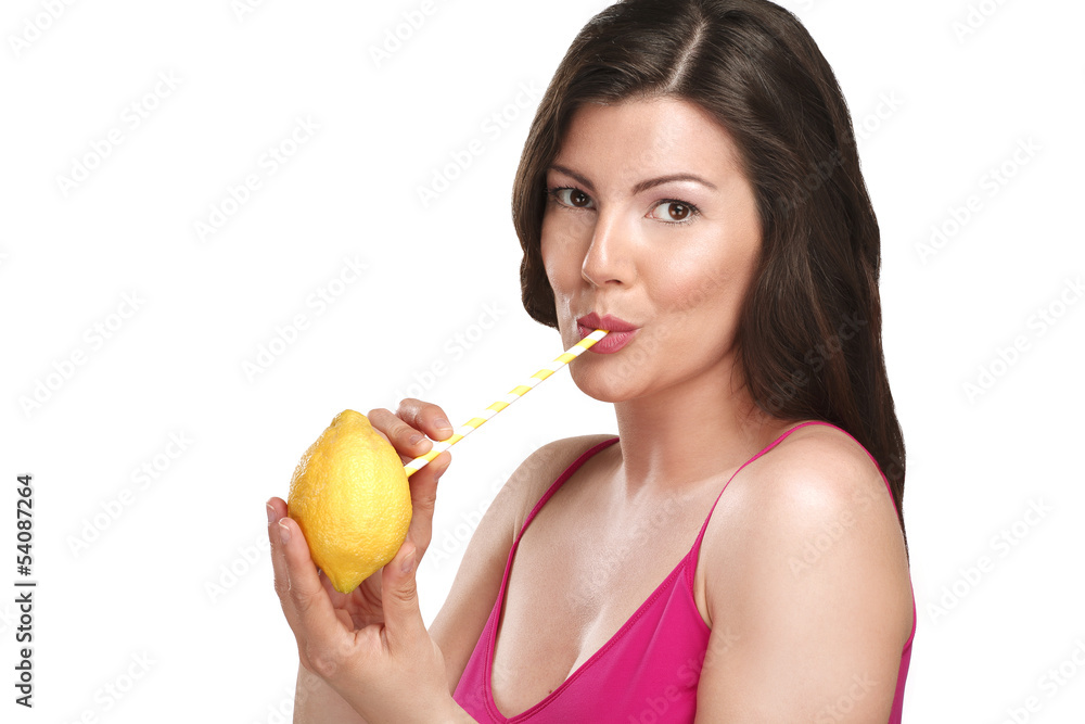 Top up on vitamin c for beautiful young woman drinking juice dir Top up on vitamin c for beautiful young woman drinking juice dir