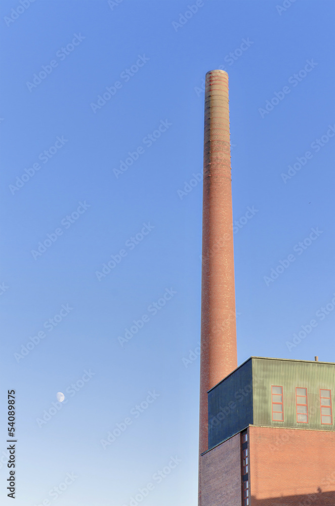 Old industrial brick chimney in Tampere Finland.