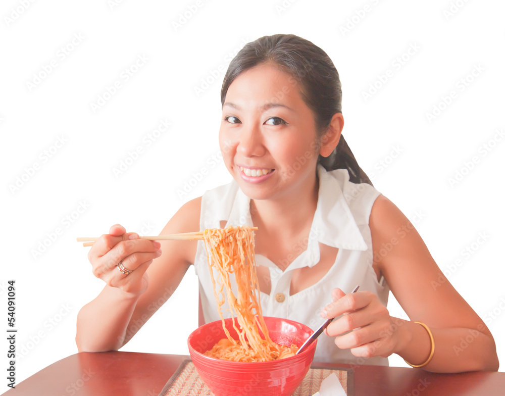 An Asian woman eating noodles, isolated on white background