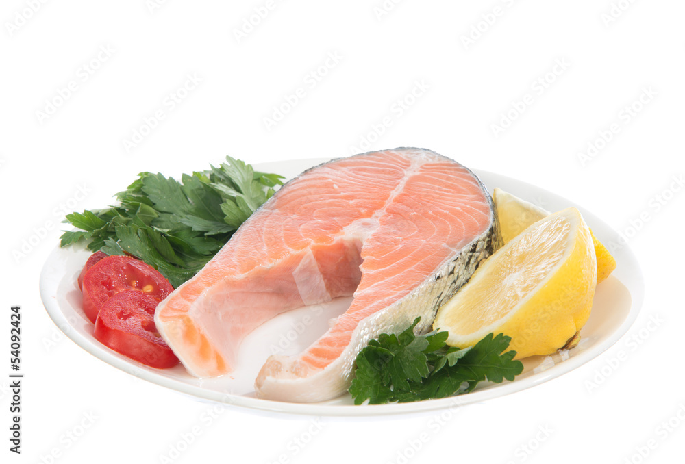Raw salmon steak red fish on a plate