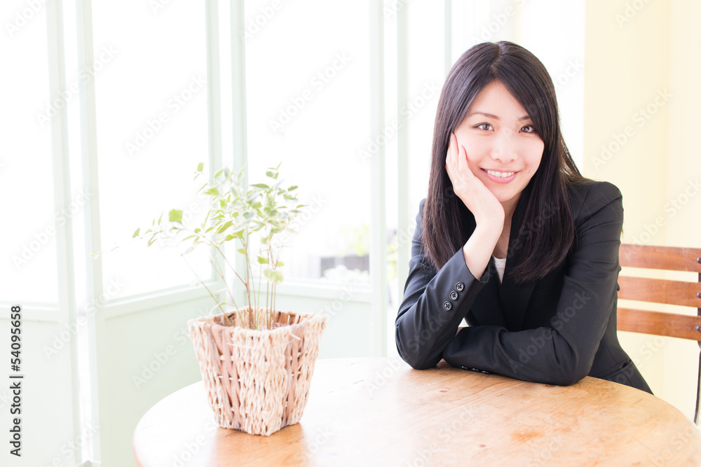 asian businesswoman relaxing in the cafe asian businesswoman relaxing in the cafe