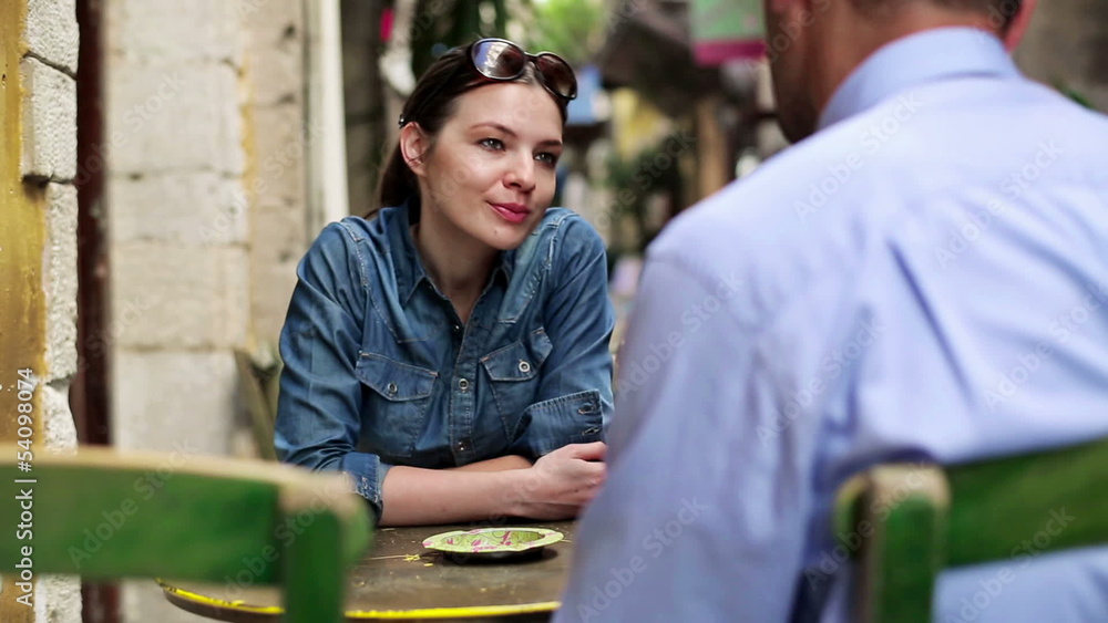 Young couple on date in cafe Young couple on date in cafe