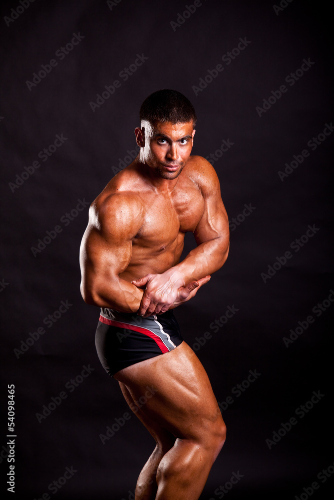 Fototapeta premium young bodybuilder posing