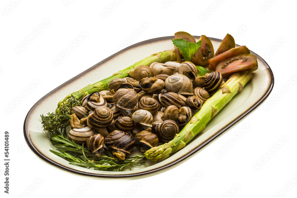 Escargot with asparagus, rosemary, thymus and tomato Escargot with asparagus, rosemary, thymus and tomato