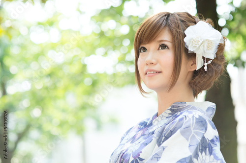 Beautiful young woman wearing japanese traditional kimono