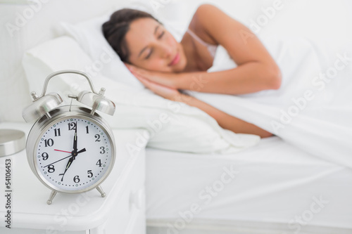 Woman sleeping deeply in bed