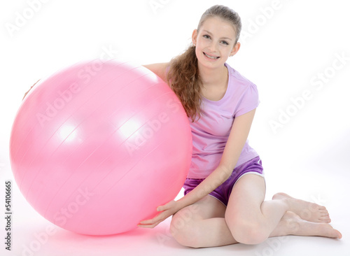 Teenager mit Gymnastik Ball