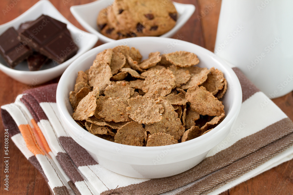 cereals in white bowl and chocolate cereals in white bowl and chocolate