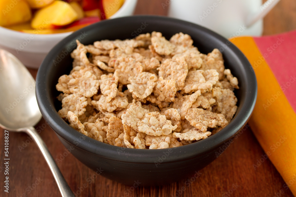 cereals in black bowl with fruits cereals in black bowl with fruits