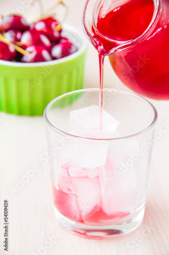 Wallpaper Mural Delicious sweet berry lemonade of cherry pour out into the glass Torontodigital.ca