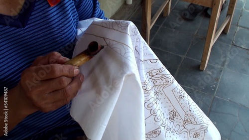 Hand painting of the Javanese traditional batik. photo