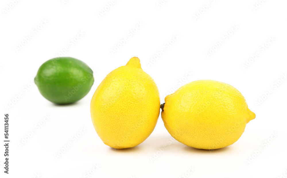 Fresh lime, two lemons isolated on white Fresh lime, two lemons isolated on white