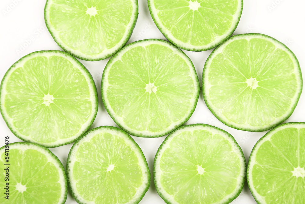 lime slices neatly arranged on a white background