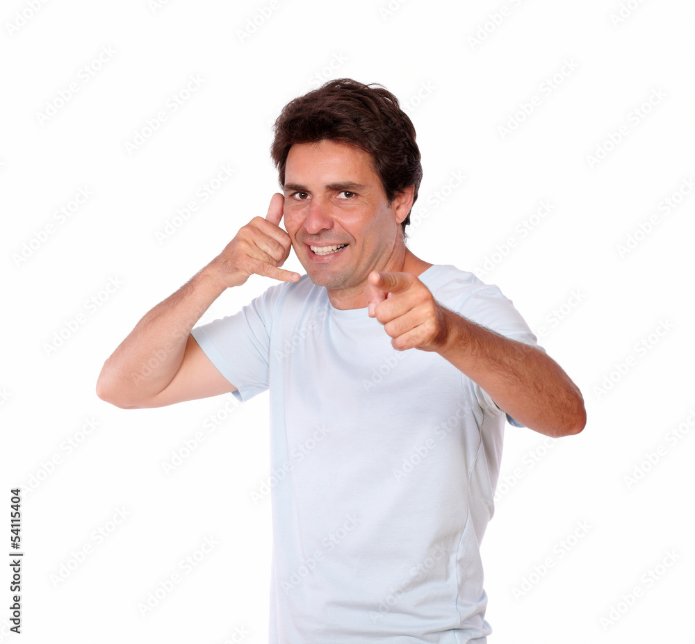 Smiling male gesturing call me with one hand Smiling male gesturing call me with one hand