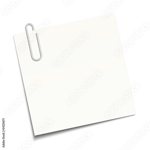 White sticky note clipped with a paperclip