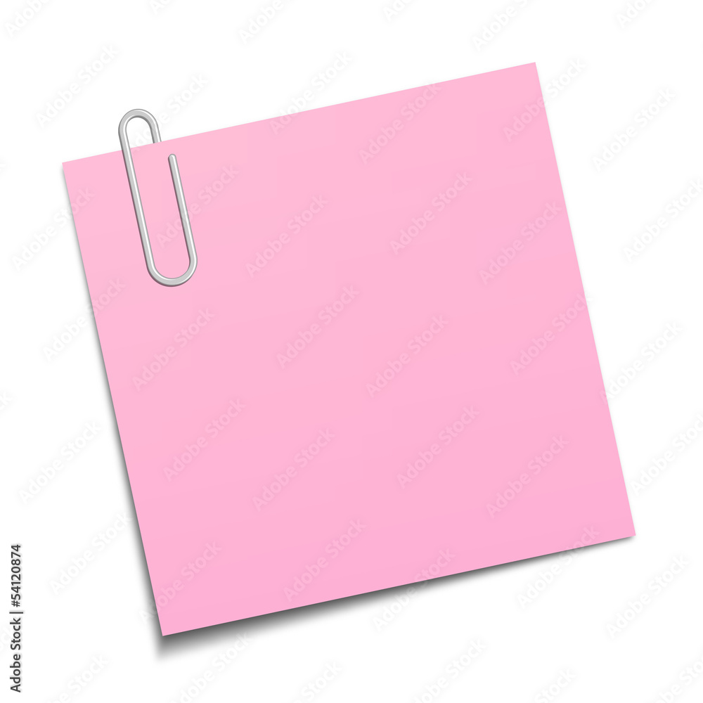 Pink sticky note clipped with a paperclip Pink sticky note clipped with a paperclip