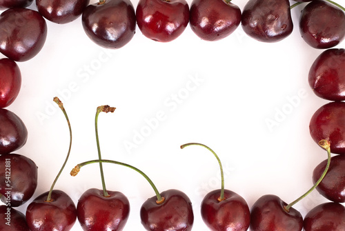 Cherries frame on white background