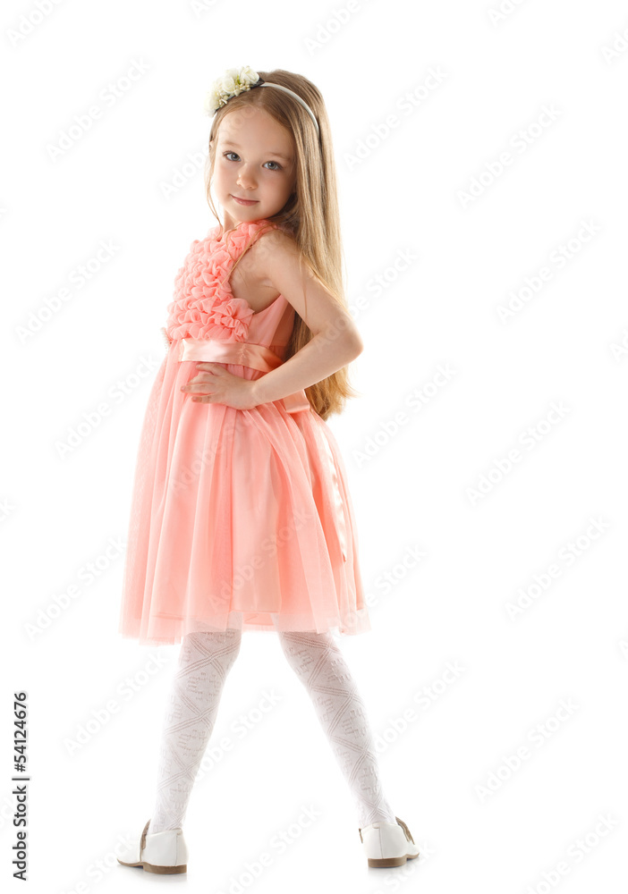 Adorable little girl posing looking at camera Adorable little girl posing looking at camera