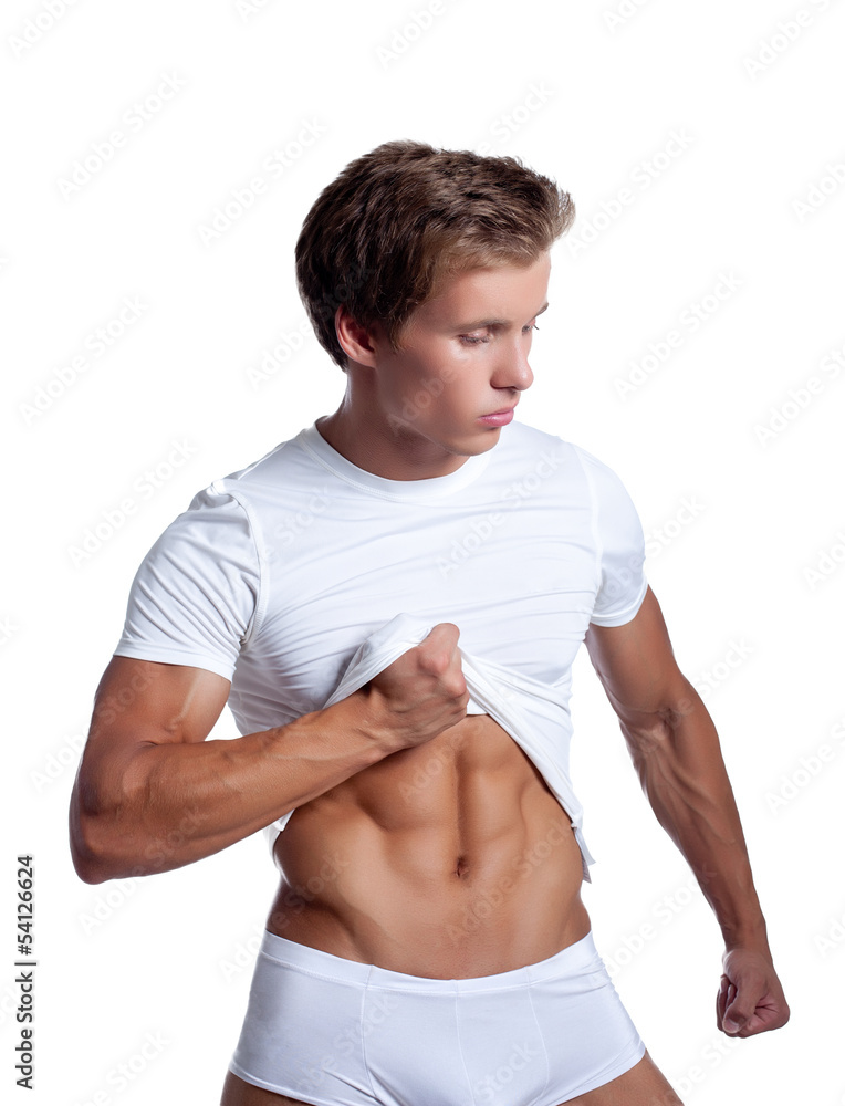 Portrait of athletic muscular man in white t-shirt Portrait of athletic muscular man in white t-shirt