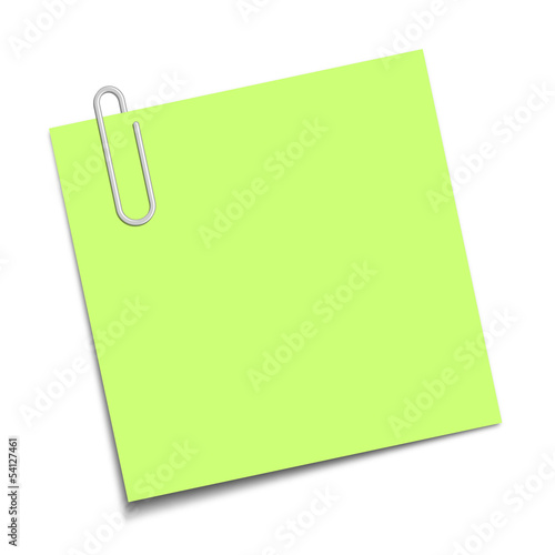 Green sticky note clipped with a paperclip