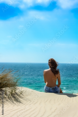 Relaxing. Young Girl Watching the Sea