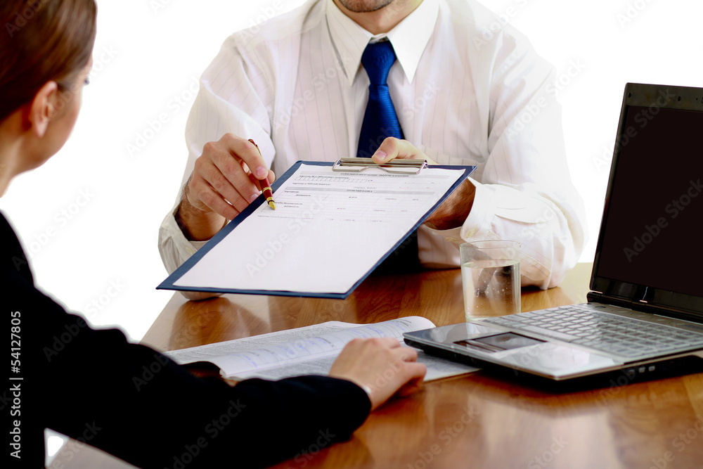 Colleagues working together in office Colleagues working together in office