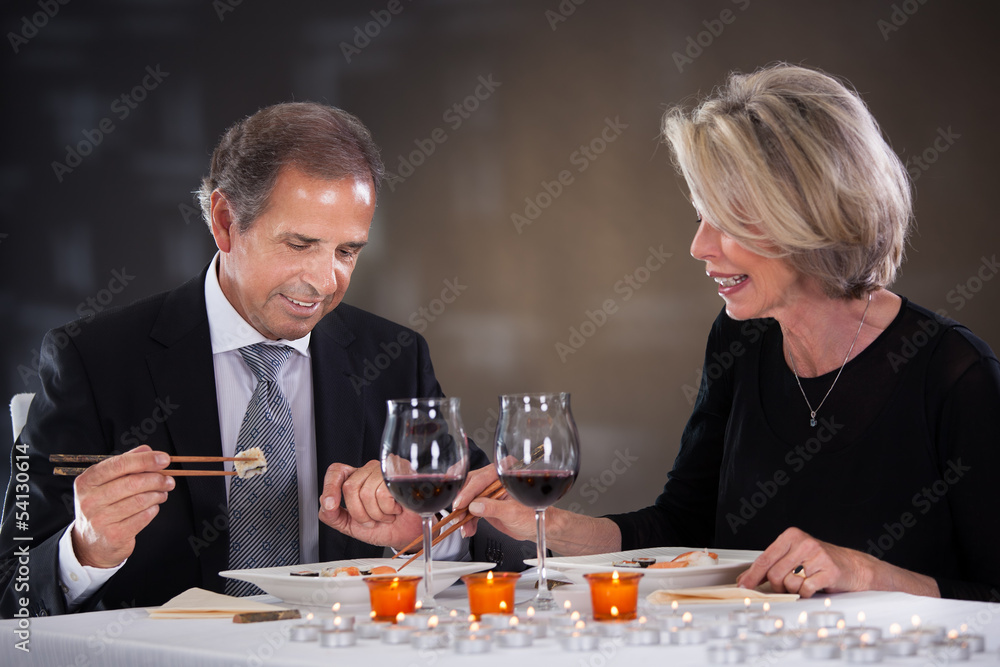 Mature Couple Sitting In A Restaurant Mature Couple Sitting In A Restaurant