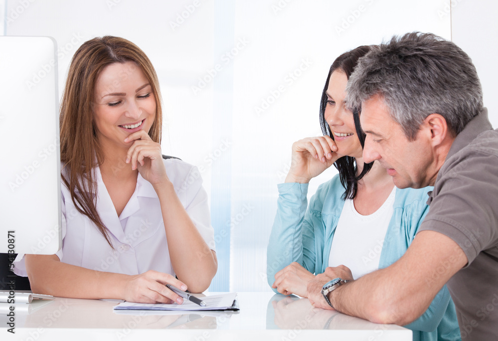 Doctor Showing Results To Patient Doctor Showing Results To Patient