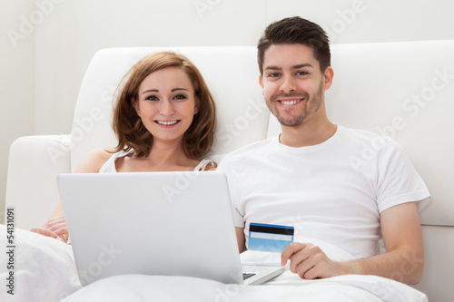 Young couple shopping online