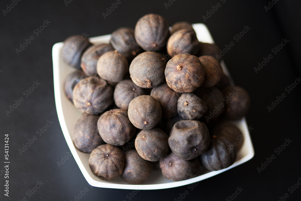 Black dried Lime or Lemon. Spice used in Middle Eastern dishes Black dried Lime or Lemon. Spice used in Middle Eastern dishes