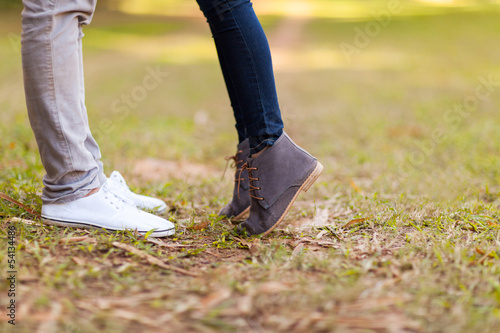 teenage couple kissing