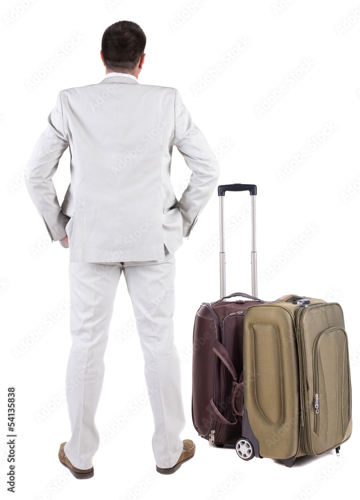 Back view of traveling busness man with suitcase Back view of traveling busness man with suitcase