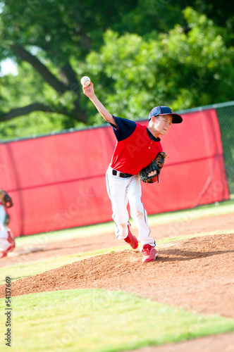 Young boy baseball pitcher