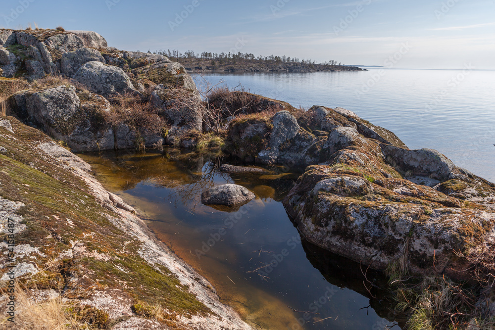 Rocky coast of lake. A landscape