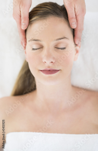 Beautiful Woman Receiving Head Massage At Health Spa