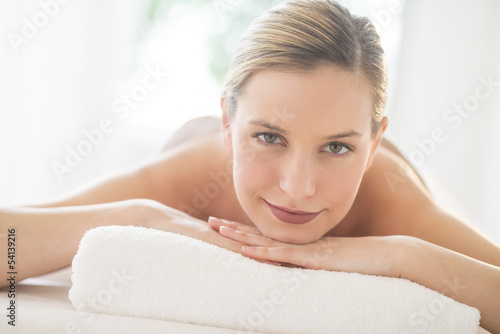 Close-Up Of Attractive Woman Relaxing At Spa