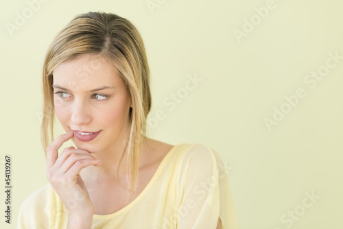 Beautiful Woman Looking Away With Hand On Chin