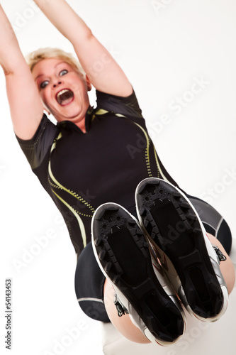 Sporty middelaged woman having fun photo