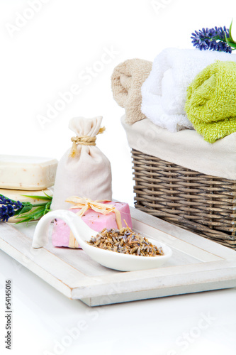 toiletries for relaxation - towel, soap, isolated on white backg photo