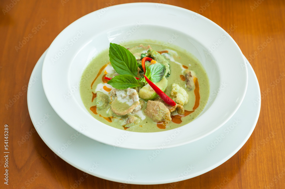 Chicken green curry with eggplant . ( Authentic thai food ) Chicken green curry with eggplant . ( Authentic thai food )